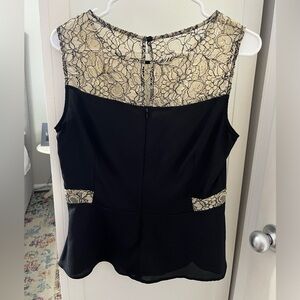 Size 8 dressy sleeveless top.